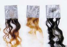 13 Hair loss is apparent in the dark brown category swatch.