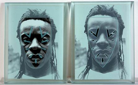 ) This new work is a unique version of the 1998 work GE Mask and Scarification shown