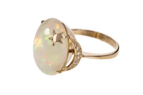 Opals are one-of-a-kind gemstones, vary in color, and can make a beautiful engagement ring within a budget a Opal Luna Ring, $1,360, Pamela Love reality.
