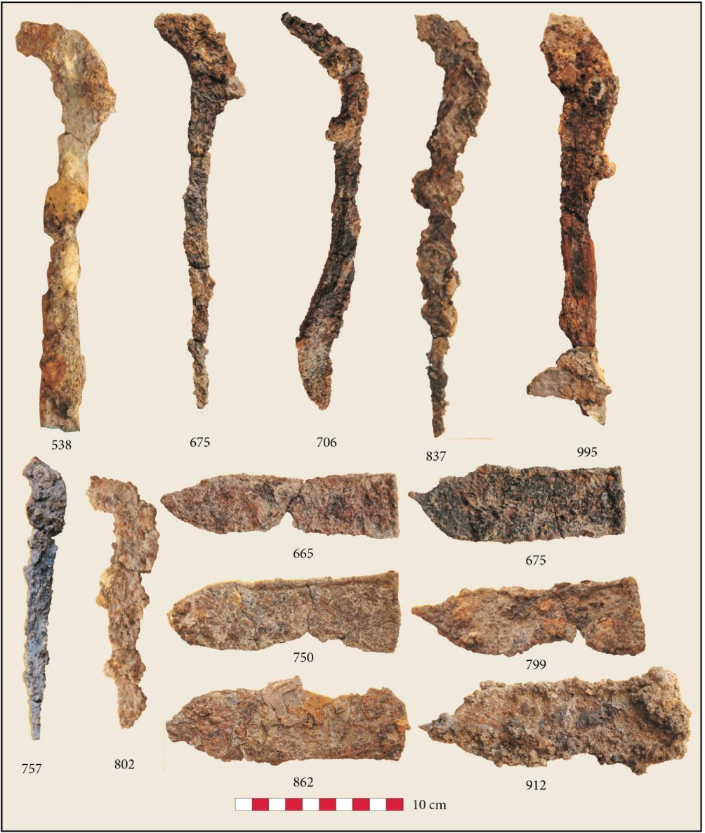 HIGHAM ET AL.: THE EXCAVATION OF NON BAN JAK, NORTHEAST THAILAND - A REPORT ON THE FIRST THREE SEASONS Figure : Iron sickles and knives from Non Ban Jak burials.