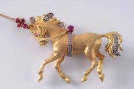 An 18ct gold, ruby and rose diamond mounted circus horse brooch,