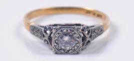 371 372 373 371. A diamond mounted single stone ring with old European cut diamond approximately 6.8mm x 4mm estimated to weigh 1.15cts in claw setting. 1000-1500. 372. An 18ct gold and diamond mounted seven stone, half hoop ring with circular, brilliant-cut diamonds estimated to weigh a total of 0.