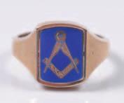 381 381. An enamelled 9ct gold Masonic ring, the swivelling bezel with Masonic compass and set-square design. 100-150. 382 382.