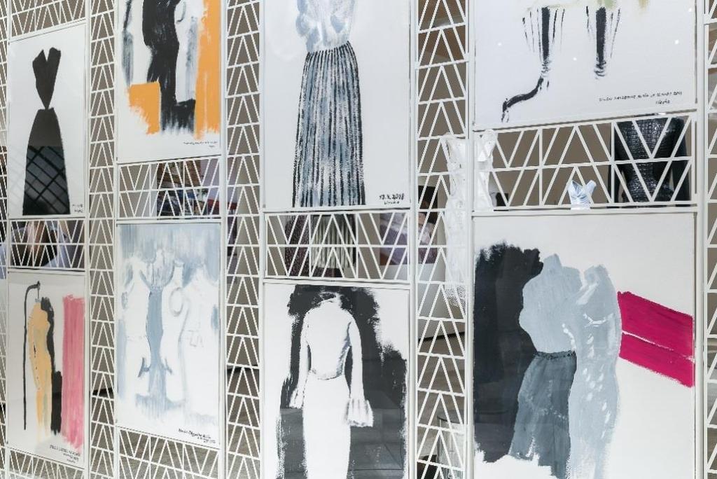 screen showcases drawings of Alaïa s creations by his lifelong partner Christoph von Weyhe.