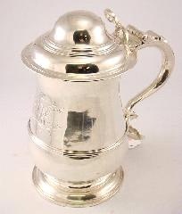 $750 - $1,250 416 Victorian silver tray, London, maker W.H., 1875/6, 28 1/4". $7,000 - $9,000 George III silver Christening mug- London 1801.