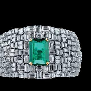 diamond cuff featuring a 16.68ct fine Zambian emerald centre stone.