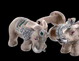 in 18K white and yellow gold, and Elephant cufflinks with rubies