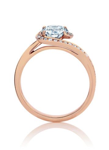 Inspired by the true harmony of love, the solitaire diamond in