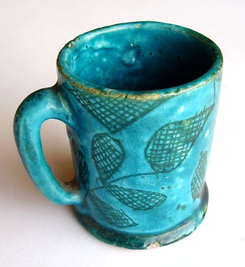 Vessel 2006.1281 Cup Ceramic / hand-crafted Small cup with straight sides on flat base, handle.