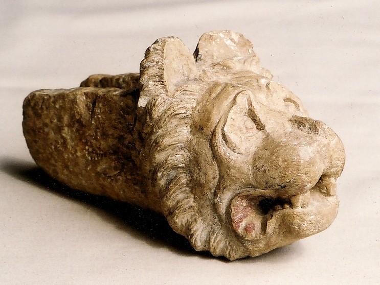 Sculpture 2006.1266 Animal head Limestone / hand-carved Afghanistan / ca. 250 BC Yellowish-ochre limestone gargoyle in form of mastiff s head with docked ears.