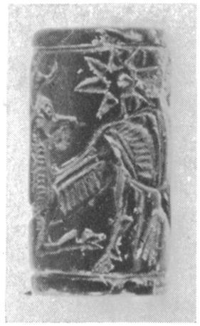 Jasper cylinder seal and an impression of it, showing a kneeling bowman shooting a bull. Assyrian, viii century B.C.