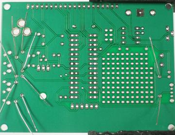 These resistors make up a multiplexed button-reading circuit that allows the chip