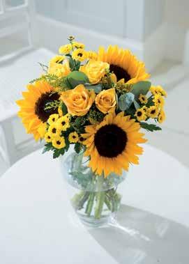 99 Code FC01293F Cheerful Smile The perfect bouquet to make them smile! Gorgeous bright yellow tones sure to bring happiness into any home.