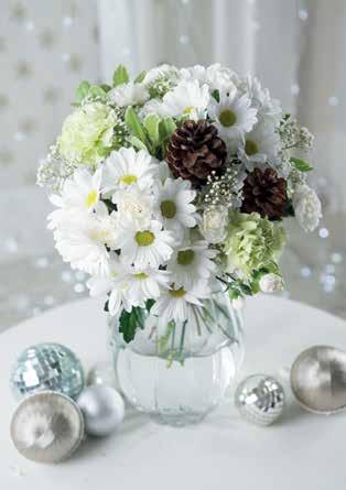 Starry Silent Night A gorgeous bouquet with a subtle and elegant feel, featuring white chrysanthemum and to add a hint of colour, green carnations.