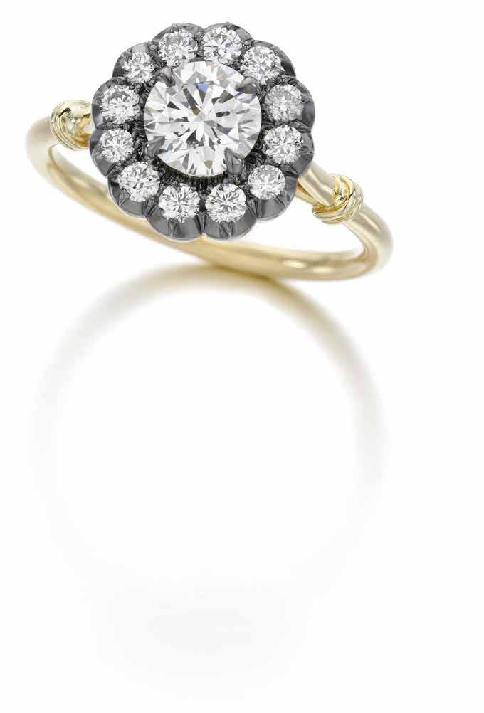 06 carats); the Signature Bridal collection. POA. Georgian Loop Ring in 18K white and yellow gold set with one 2.