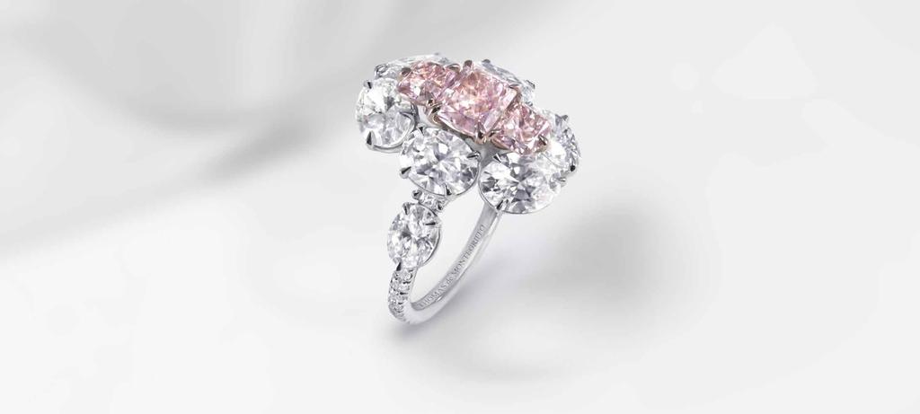 Fleur de Lilas ring in platinum and 18K pink gold (talon setting for the pink diamonds) set with three fancy purplish-pink diamonds (total weight of 1.