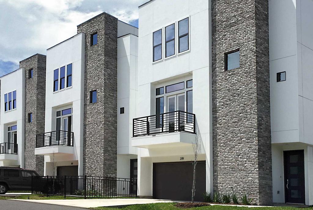 An enclave of 20 Freestanding 3-Story Townhomes From the low $400 s 713.