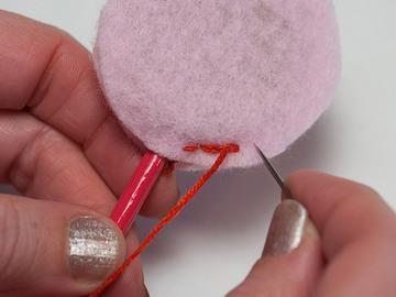 Thread a piece of floss and use a split stitch (https://adafru.