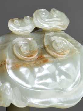 century This well-rounded jade carving has been used as a paperweight or could be worn as a