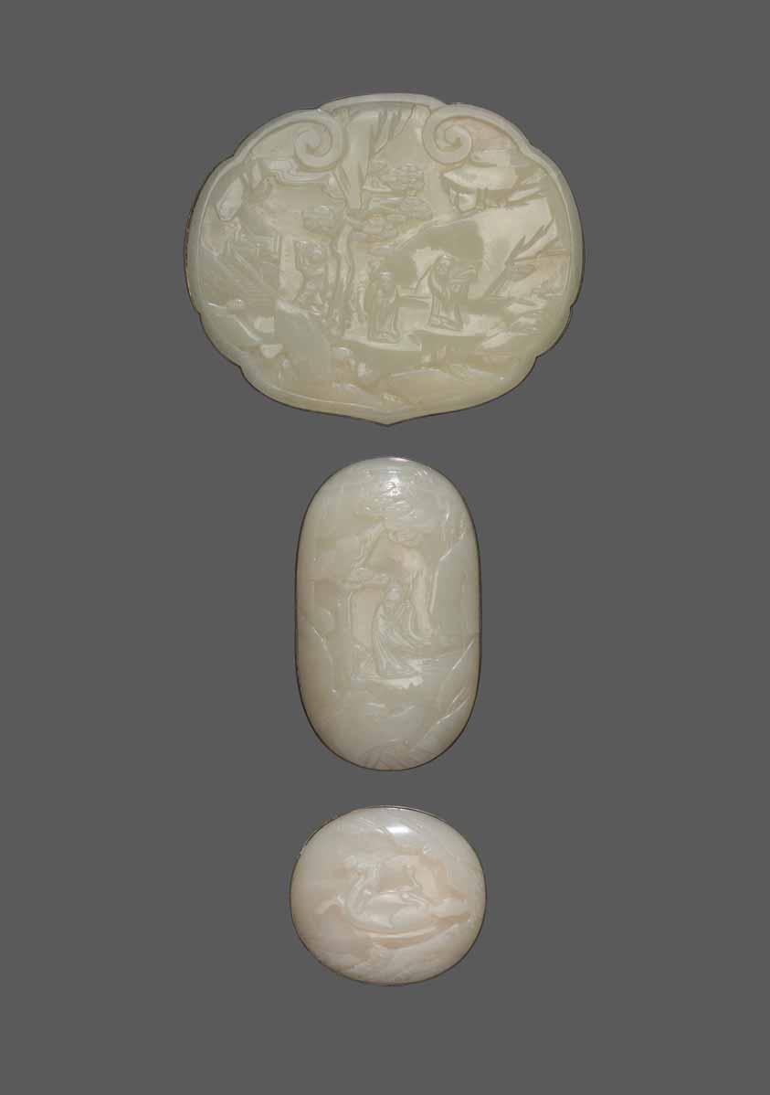 38 THREE WHITE JADE PLAQUES FOR RUYI SCEPTER, QING DYNASTY White jade with a slight pale celadon tint, few natural inclusions, excellent surface polish. Silver mountings.