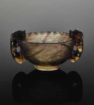68 A QING DYNASTY SMOKY QUARTZ BRUSH WASHER IN LIBATION CUP SHAPE Smoky quartz of fine transparent quality in yellow to deep brown hues, natural inclusions.