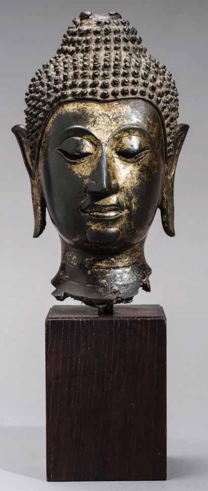 112 A 15 TH CENTURY AYUTTHAYA PERIOD GILT BRONZE HEAD OF BUDDHA Bronze with remains of lacquer gilding.
