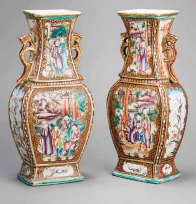 124 A PAIR OF 18 th CENTURY EXPORT PORCELAIN MANDARIN VASES Painted in vivid and detailed enamels as well as iron red and gold on white ground, the foot rim with a turquoise glaze, the inside with a