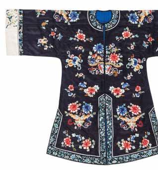 138 A MIDNIGHT BLUE SILK LADY S ROBE WITH FLOWERS AND BUTTERFLIES, 1920s Silk with multi-colored silk threads, pierced, woven application borders, embroidered bands at the hems and embroidered silk
