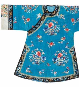 The hems at the lower part, collar and sleeves are featuring a broad, floral band embroidered in blue hues and stitched with Buddhist symbols in gold brocade.