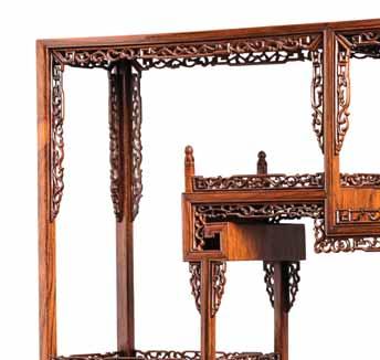 Detail of the grain at the top of the cabinet 158 A HARDWOOD DISPLAY TABLE-CABINET, LATE QING DYNASTY The wood with an overall consistent