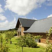 The chapel is light and open, finished with a natural wood ceiling and offers striking views across the countryside beyond. It is able to seat 126 people on two floors.
