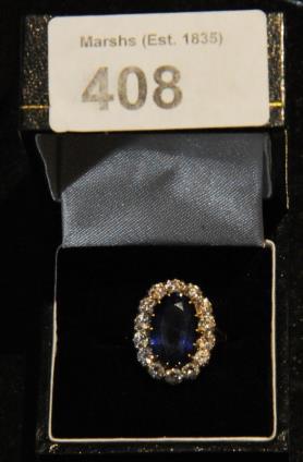 A Diamond & Sapphire Cluster Ring with