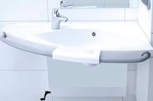 The height can be adjusted 200 mm by aid of an electrical engine. The height-adjustment is operated by a control panel on the front of the washbasin.