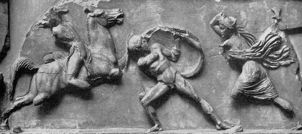 Fig. 11. Detail of Halicarnasus frieze showing bare-breasted Amazon. frieze). An Amazon on the left rides bareback astride a rearing horse without saddle or reins.