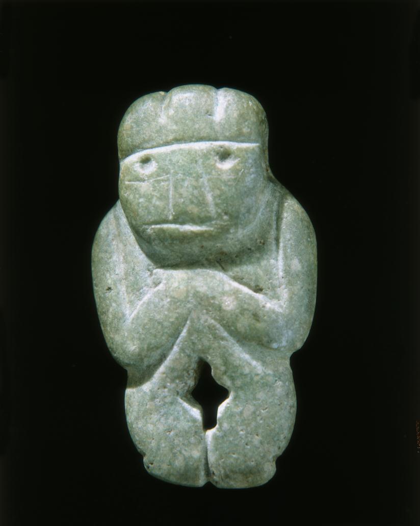 Image courtesy of Peabody Museum of Archaeology and Ethnology (Coggins and Shane 1984: 134) Figure 8: "Charlie Chaplin" figure from Cenote of Sacrifice Chichén Itzá Summary The presence of Charlie