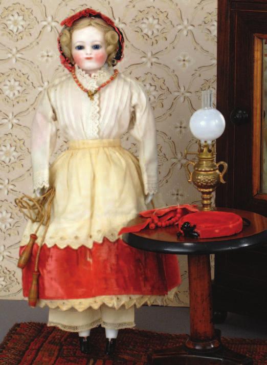 mind. Fernande s wig, which has never been removed, is of natural blond human hair and retains its original set of tiny delicate curls the style popular for little girls in the 1860s.