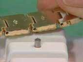 19 4) Press the protruding pin down by using
