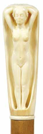 75. Carved Ivory Nude Ca. 1890-A nice carved full frontal nude in ivory, small ivory collar, pair of ivory eyelets with sash, malacca shaft and a horn H. 1 ½ x 4, O.L. 37 ½ $800-$1,200 76.