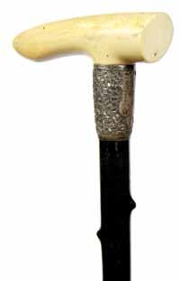 wood shaft and a horn H. 6 x 2 x 2 ½ -O.L.37 $1,800-$2,500 90. 89. 89. Ivory Dress Ca. 1890-A stylized ivory handle, ornate silver metal collar, black twigspur shaft and a metal H. 5 x 1 ¼, O.L. 36 $400-$500 90.