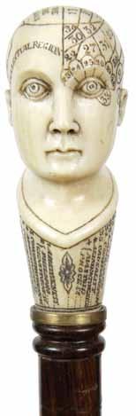 92. Ivory Egyptian Style Ca. 1910-A carved Egyptian style ivory handle, ivory collar, exotic wood shaft and a bone H.