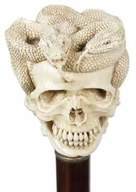 snakes upon the skull with great detail applied to every bone,