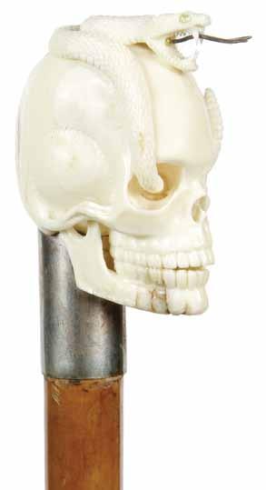 219. Ivory Skull And Snake Pre-band-A large carved ivory skull with a rattle snake atop, silver metal collar, 1 malacca shaft and