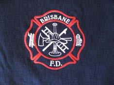 Tee Shirts solid dark blue, maltese cross, BFD with Brisbane Fire Department over and under on back.