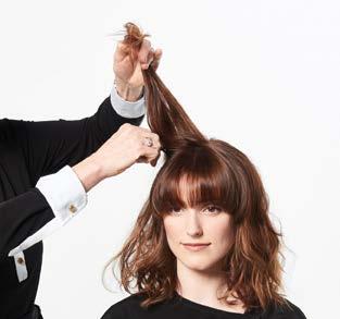 After hair has been fully blown dry with a round brush, apply Hair Shake throughout.
