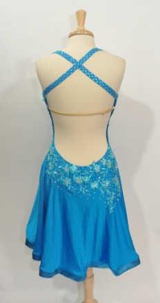 3) A tailored dress completed Color in Turquoise Combine the look