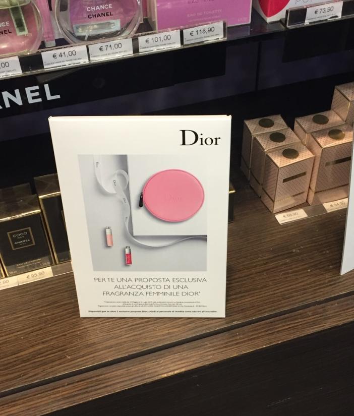 Dior 1. Exclusive pink Dior embossed branded coin purse 2.