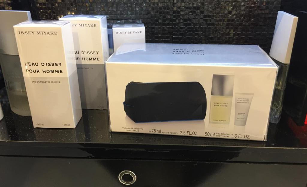 Issey Miyake 1. Black wash bag 2. Free with 75ml EDT and 50ml shower gel @ 61.50 EUR 3.
