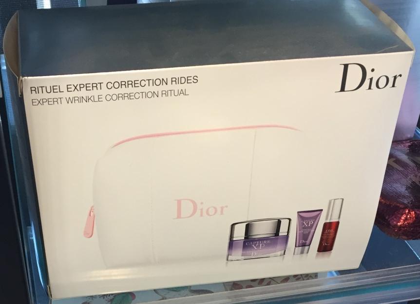 Dior 1. White PU make up bag with pink zip and branding 2.