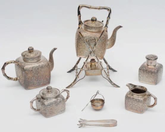 111 A Chinese five piece silver tea set, early 20th century, comprising; kettle on stand with burner, teapot, sugar bowl with cover, cream jug and tea canister, with square bodies, decorated with