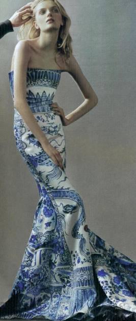 51d illustrates a typical Qipao with four motifs.